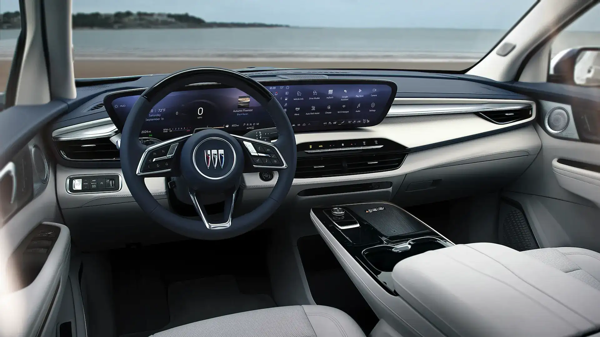 Interior view of the front seats and media console of the Buick Enclave Avenir