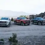Line up of GMC Canyon Trucks on a mountain