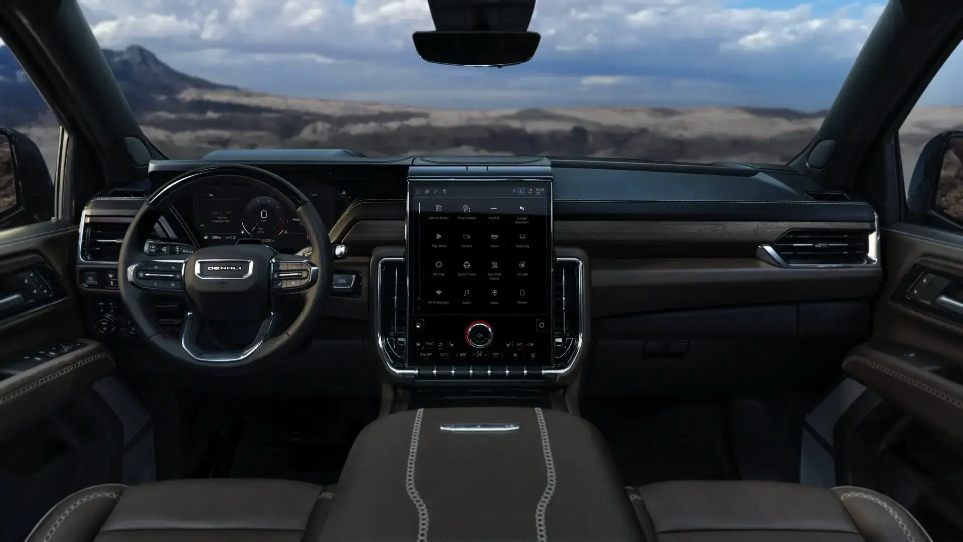 Interior view of GMC Yukon Denali Ultimate front driver and passenger seat and media console