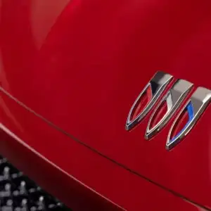 2026 Buick Enclave Cherry Red Tintcoat emblem