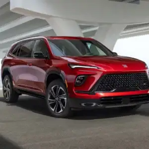 2026 Buick Enclave Cherry Red Tintcoat parked under a bridge