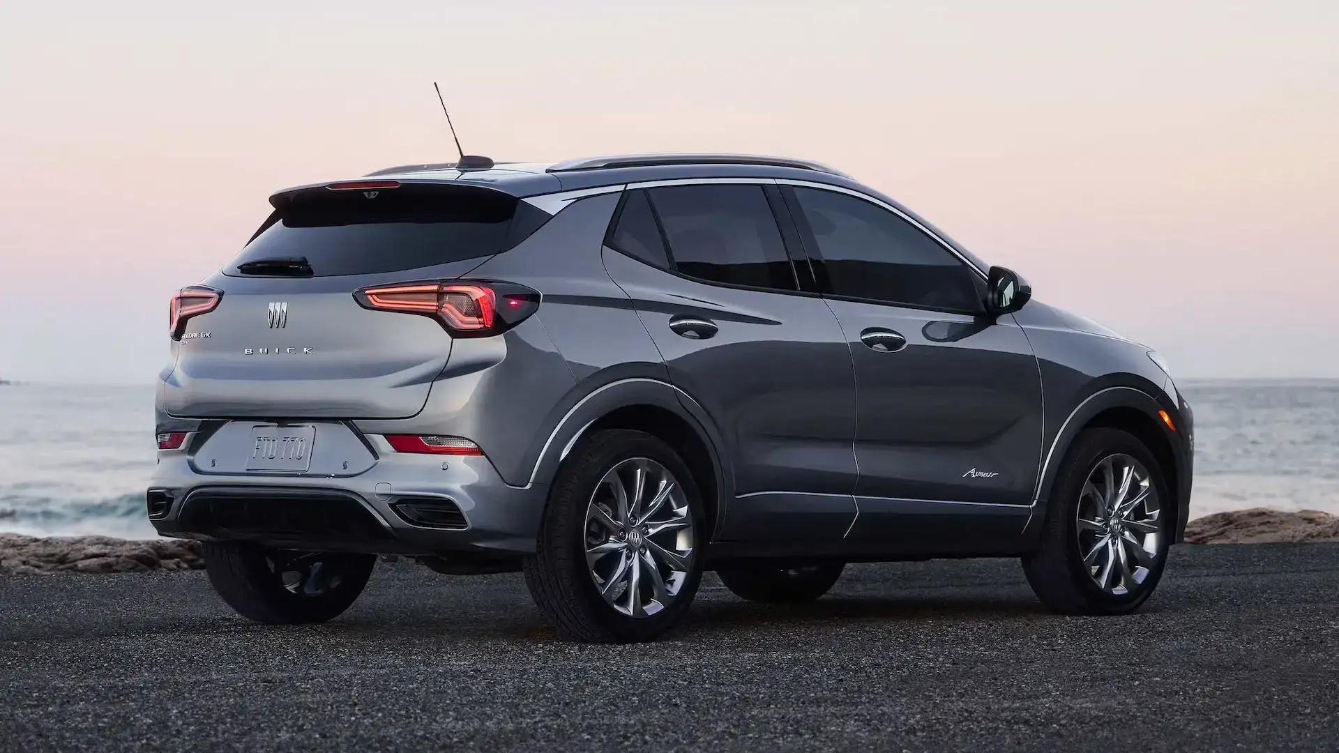 2026 Buick Encore GX Avenir gray facing the ocean