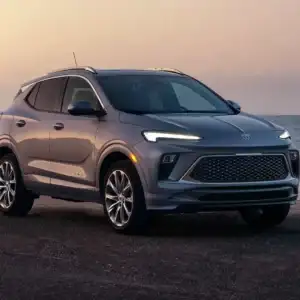 2026 Buick Encore GX Moonstone Gray on beach with waves crashing