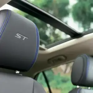 2026 Buick Encore GX Sport Touring Ebony headrests with Santorini Blue stitching