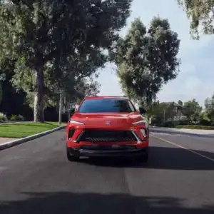 2026 Buick Envision Brilliant Red front view in motion