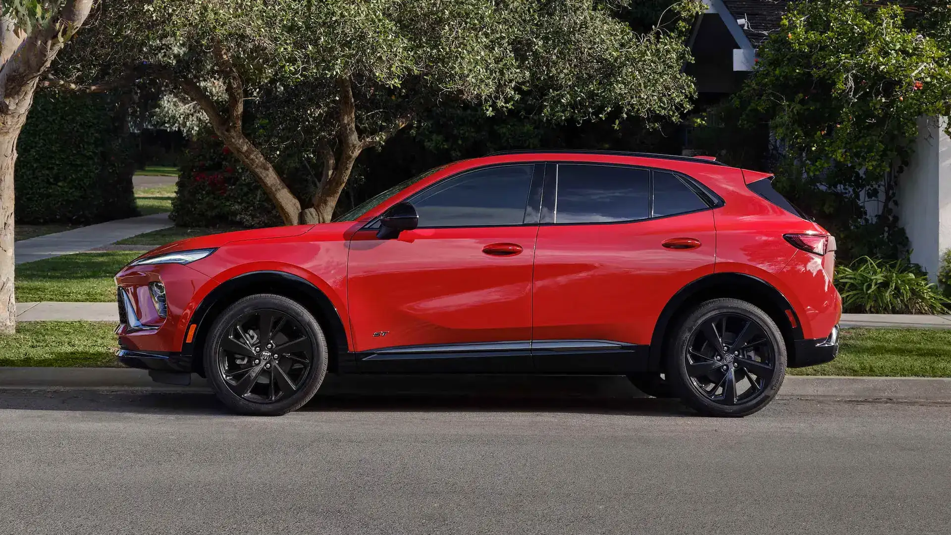 2026 Buick Envision Sport Touring Brilliant Red side view