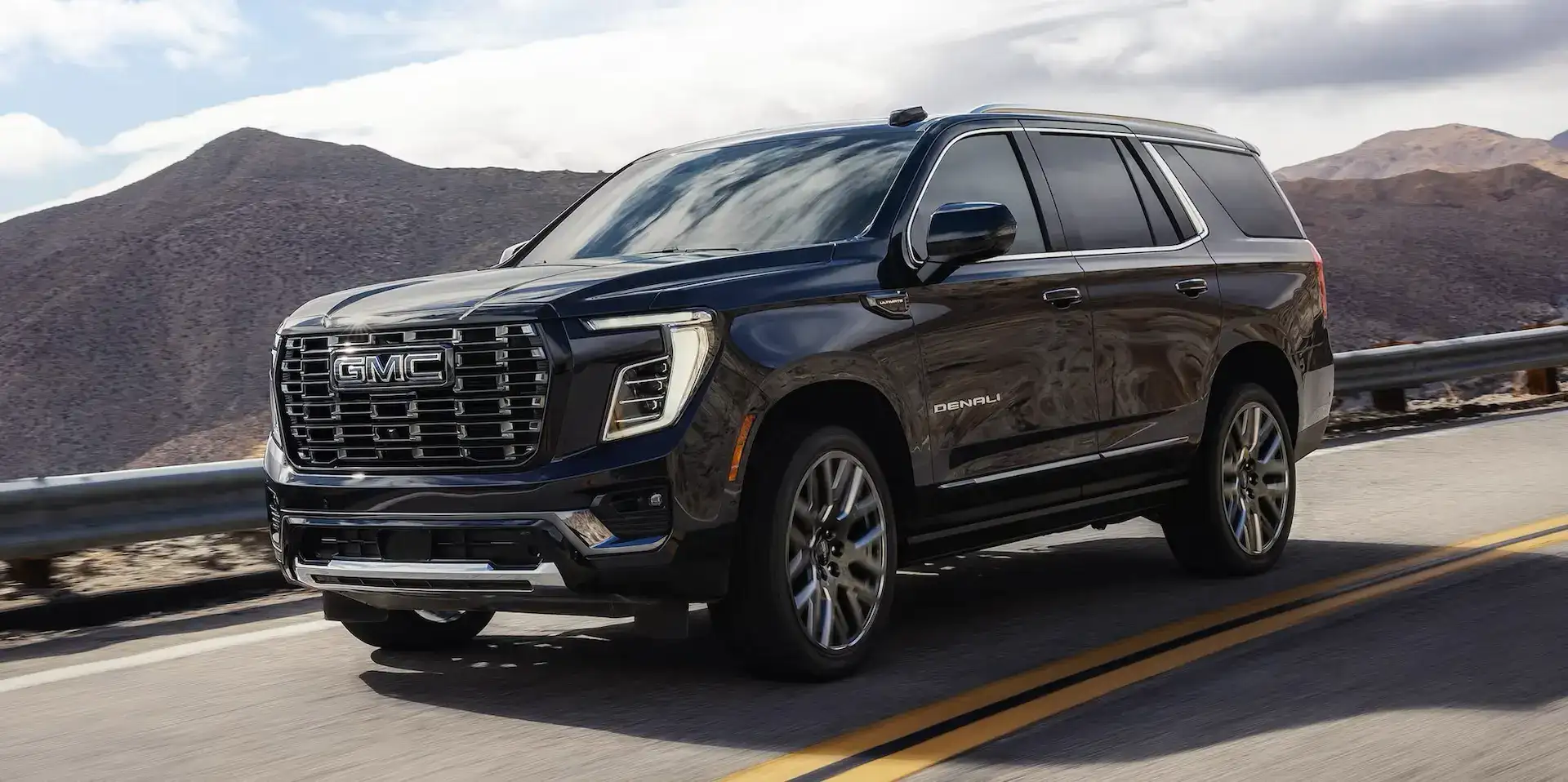 2026 GMC Yukon and Yukon XL Front and Driver's Side 3/4 View
