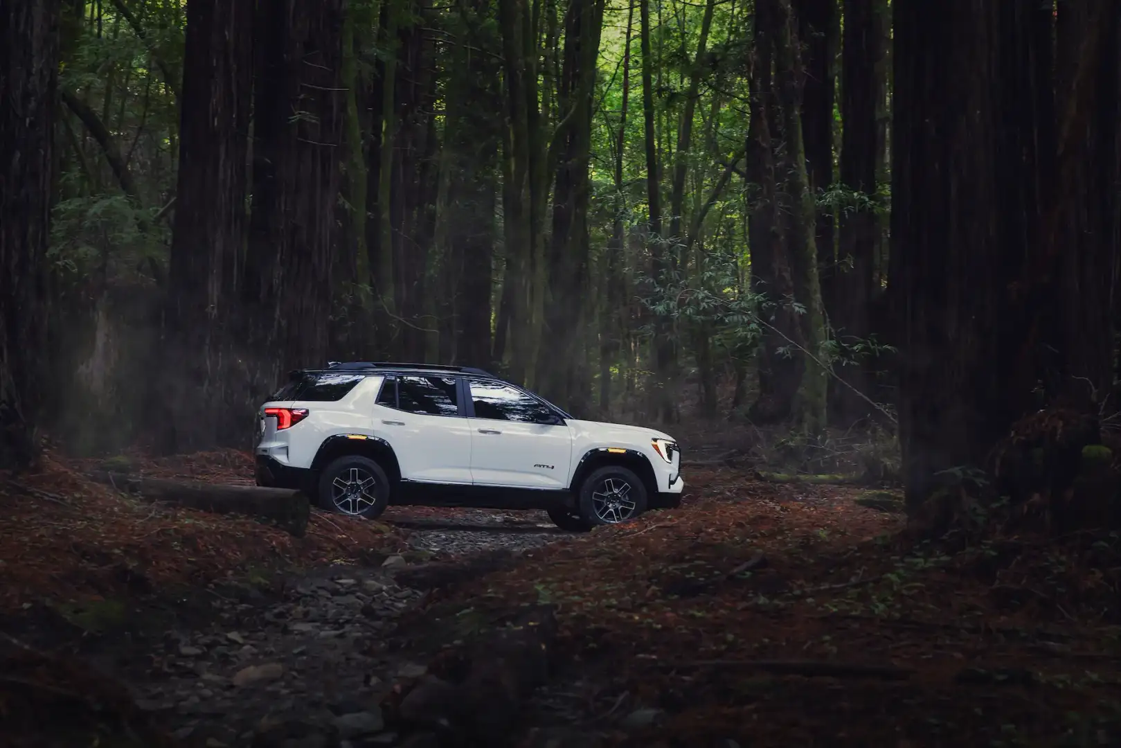 GMC Terrain AT4 off roading in the woods