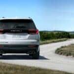 2026 GMC Acadia Denali Ultimate Rear View Driving