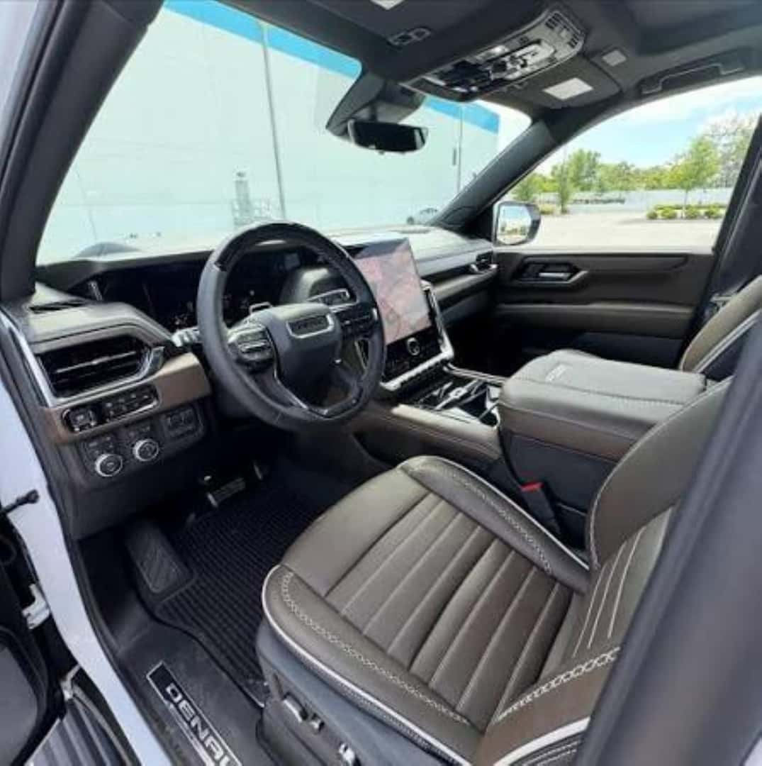 The Beautiful Perforated Full-Grain Leather Front Seats Of The Fashionable And Comfortable GMC Yukon Denali