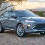 The Affordable And Budget-Friendly 2026 Buick Envista, Parked Outside A Beautiful Family Home With A Large Tree In Front