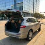 2026 Buick Enclave with liftgate open near Plano Texas corporate campus on Legacy Drive