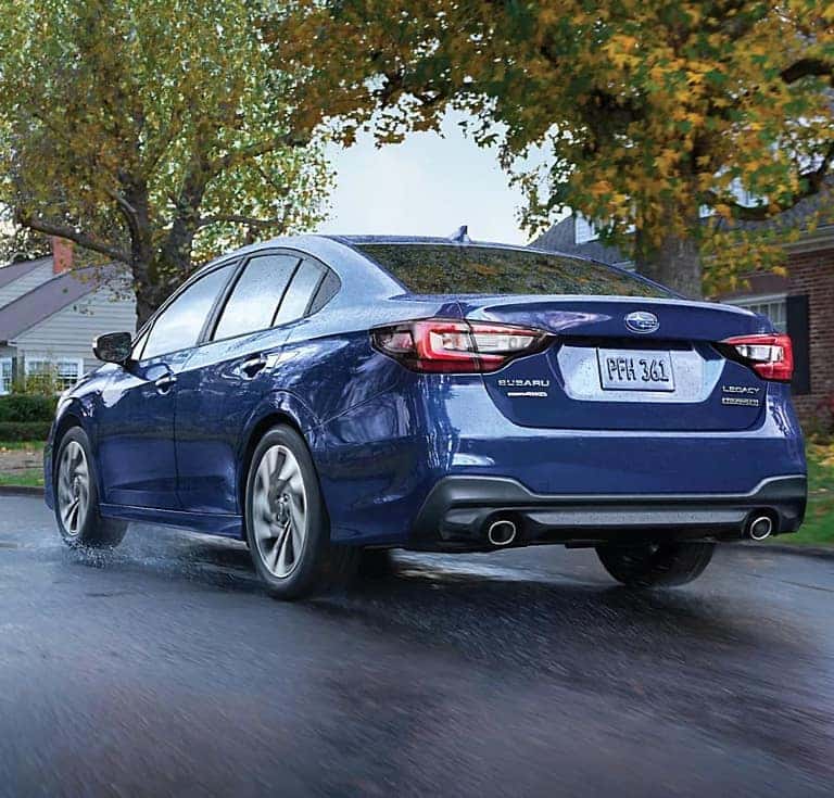 blue subaru legacy from rear