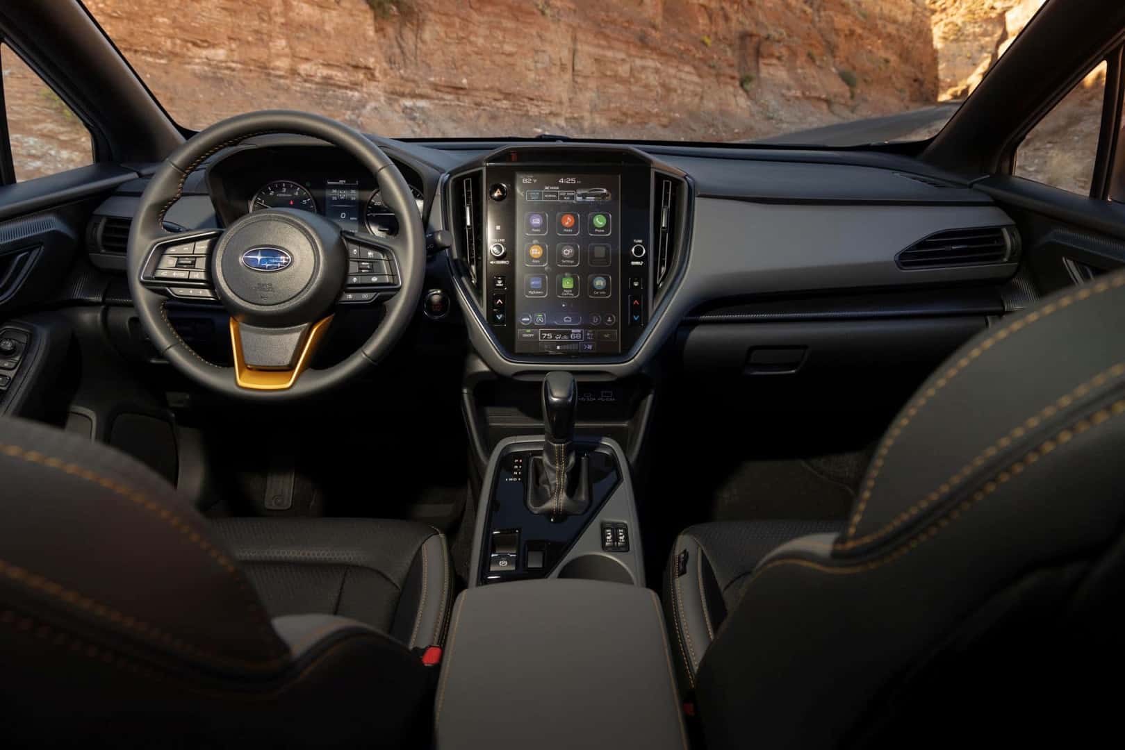 The Relatively Spacious 2024 Subaru Crosstrek Wilderness' Front Interior, With Fun Buttons And A Large Infotainment Screen