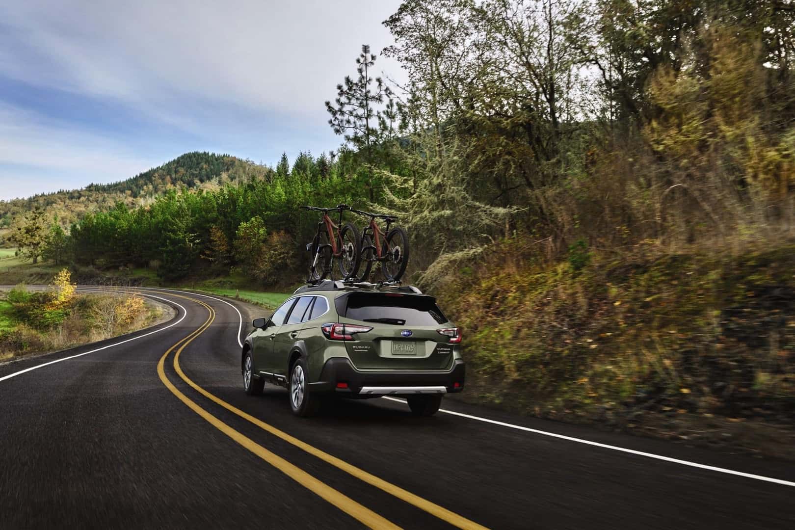 The Bold Subaru Outback, Carrying Two Bikes On The Roof