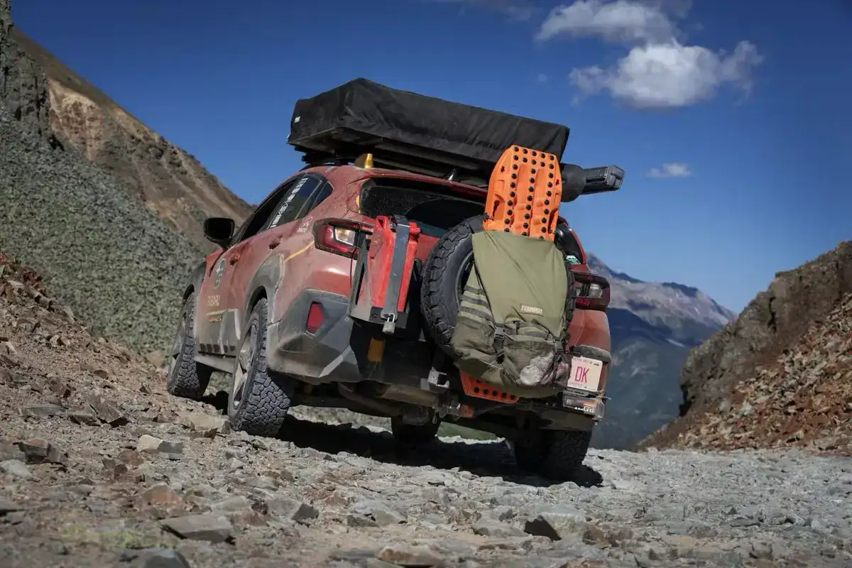 2025 Subaru Crosstrek modified for TransAmerica drive parked off road view of the back