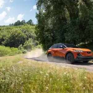 2026 Subaru Uncharted Habanero Orange Metallic in motion