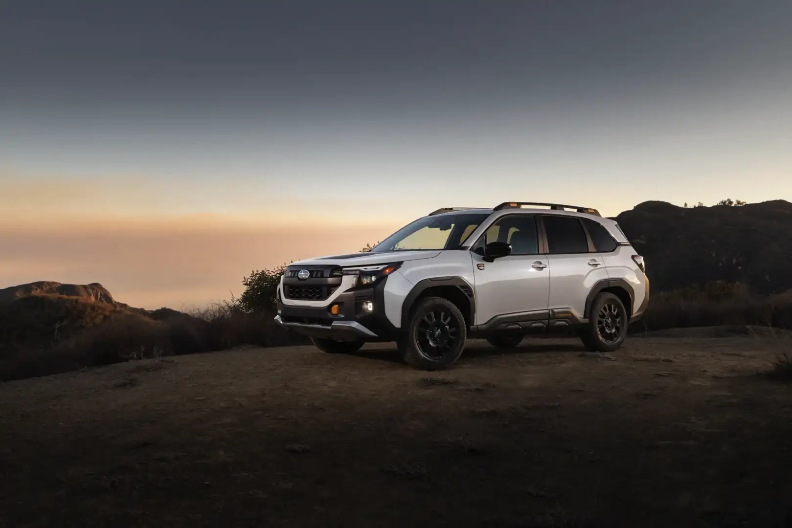 2026 Subaru Forester Wilderness parked at sunset off road