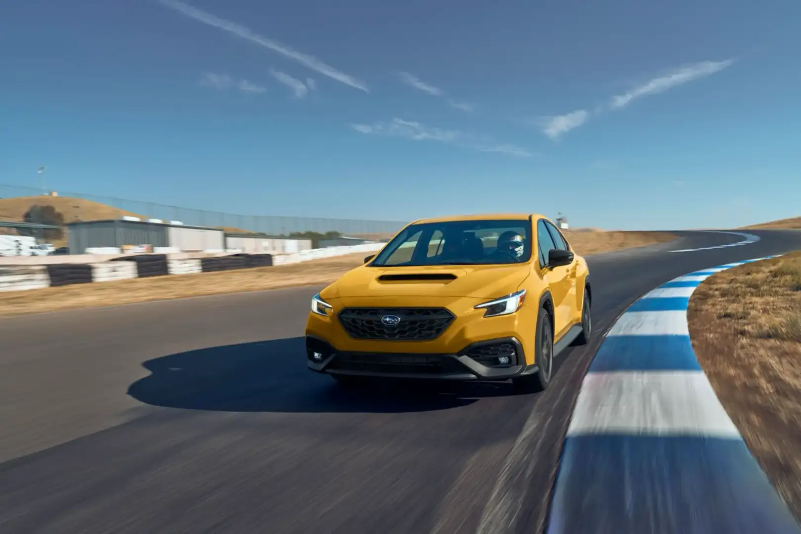 2026 Subaru WRX yellow in motion
