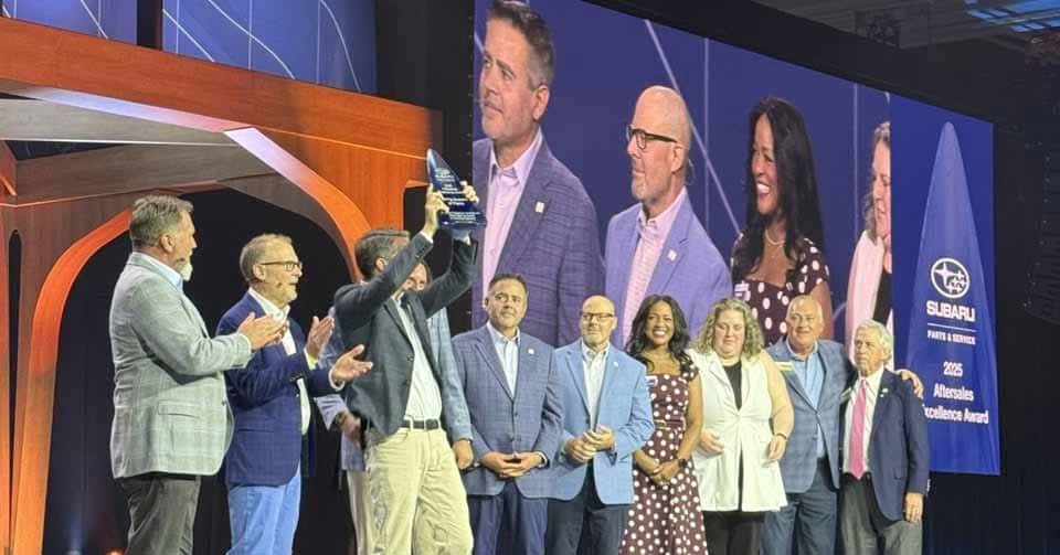 Ewing Subaru of Plano team receiving the 2025 Subaru Aftersales Excellence Award for #1 vehicle service quality and customer retention in America