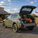 2026 Subaru Crosstrek at a North Texas pumpkin patch with rear hatch open and pumpkins loaded in the cargo area