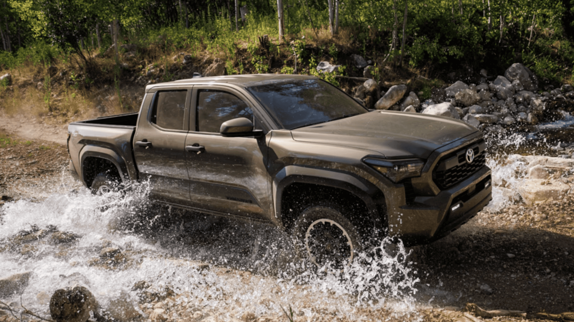 2025 Toyota Tacoma Trailhunter with red and black interior for sale near Spring, TX.