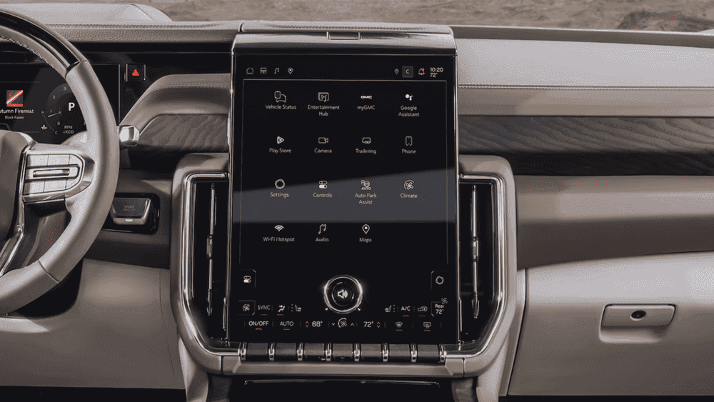 2026 GMC Yukon Denali near Ruth NC with large vertical touchscreen showing Google Assistant and Climate