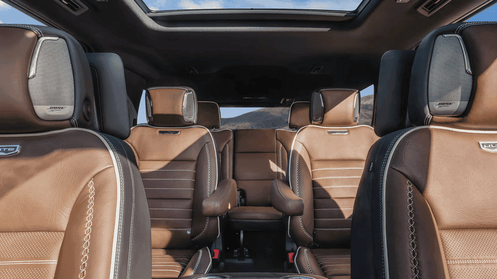 2026 GMC Yukon Denali interior near Ruth NC with tan leather seating, Bose speakers, and sunroof