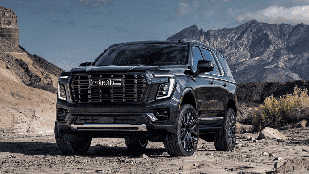 2026 GMC Yukon Denali near Ruth NC in gloss black with GMC grille and blacked-out alloy wheels