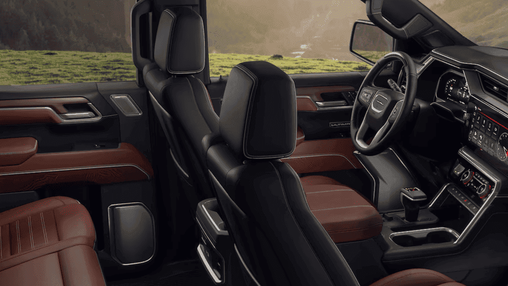 2026 GMC Sierra 1500 Denali near Shelby NC cabin with brown leather seats and Ultimate badging
