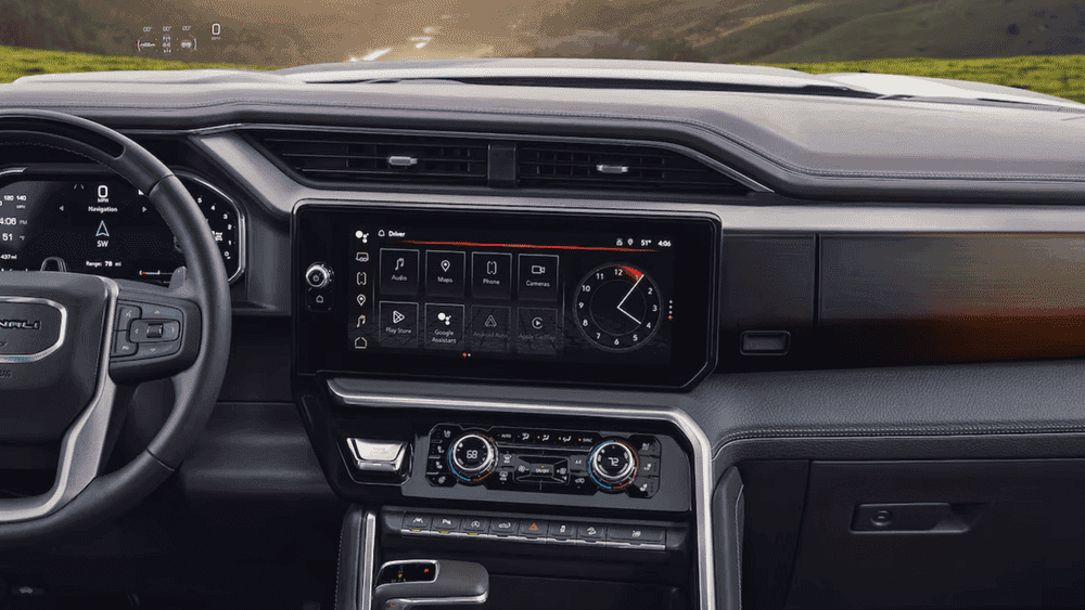 2026 GMC Sierra 1500 Denali near Shelby NC touchscreen showing Audio, Maps, Google Assistant, and Apple CarPlay