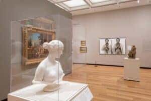 Amon Carter Museum of American Art Gallery of images on the wall and a bust statue
