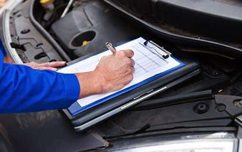 Mechanic with a clipboard