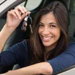 Woman showing new car keys