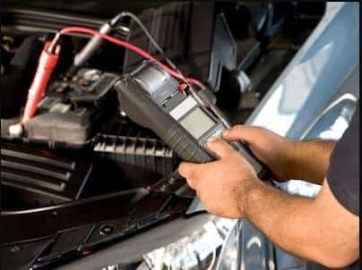 Land Rover Service Tech performing test