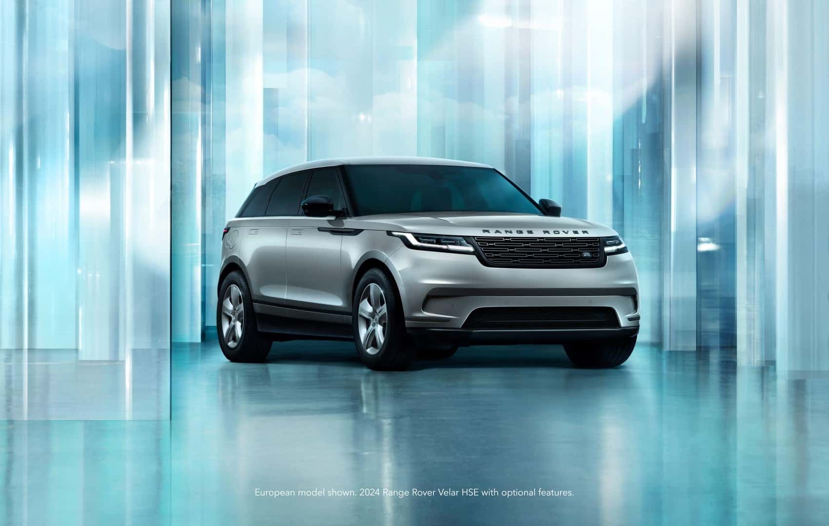  2025 Land Rover Range Rover Velar parked in blue room. 