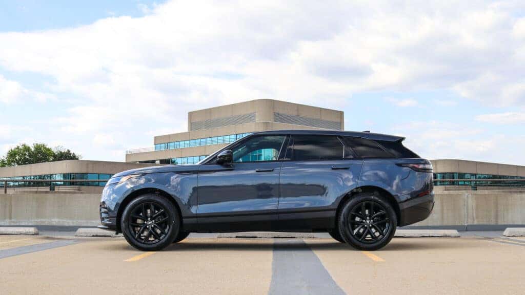 All-new 2026 Range Rover Velar parked outdoors highlighting its sleek profile