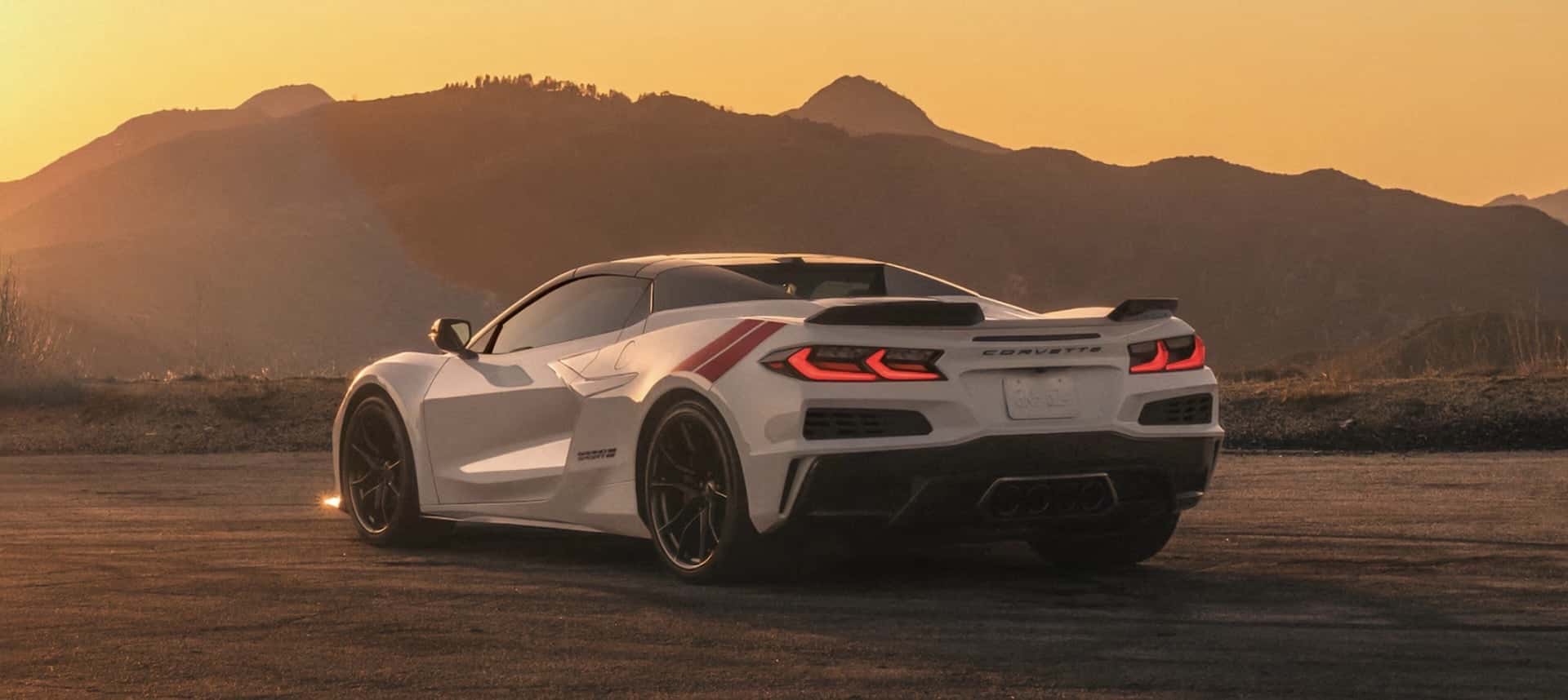 White 2027 Corvette Grand Sport at sunset