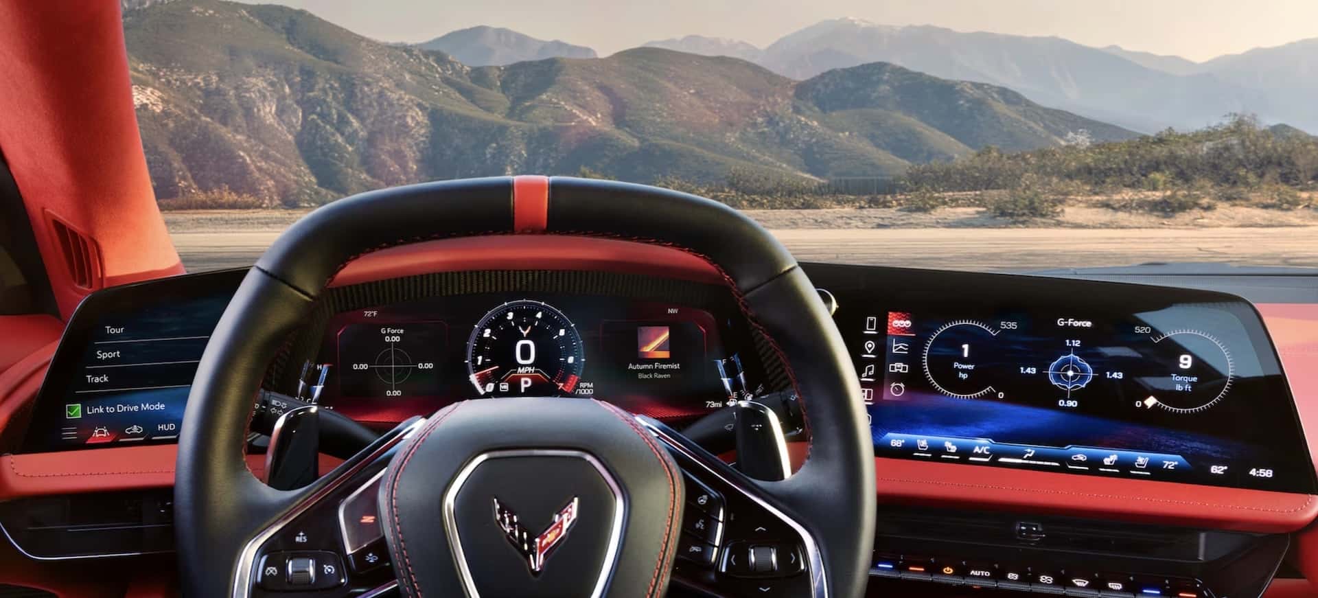 2027 Corvette Grand Sport driver display, steering wheel and red-trimmed cockpit