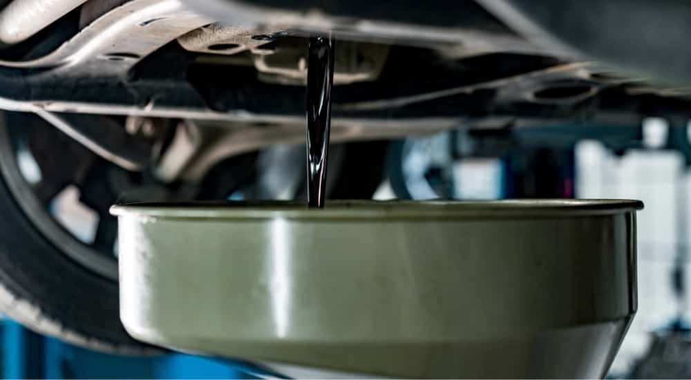 Oil draining from a vehicle at a Buick service center