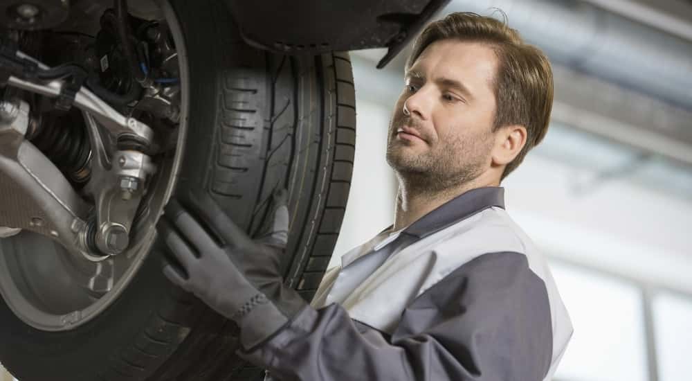 Technician doing a tire rotation
