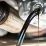 Oil draining from a vehicle are a Buick service center in Cincinnati