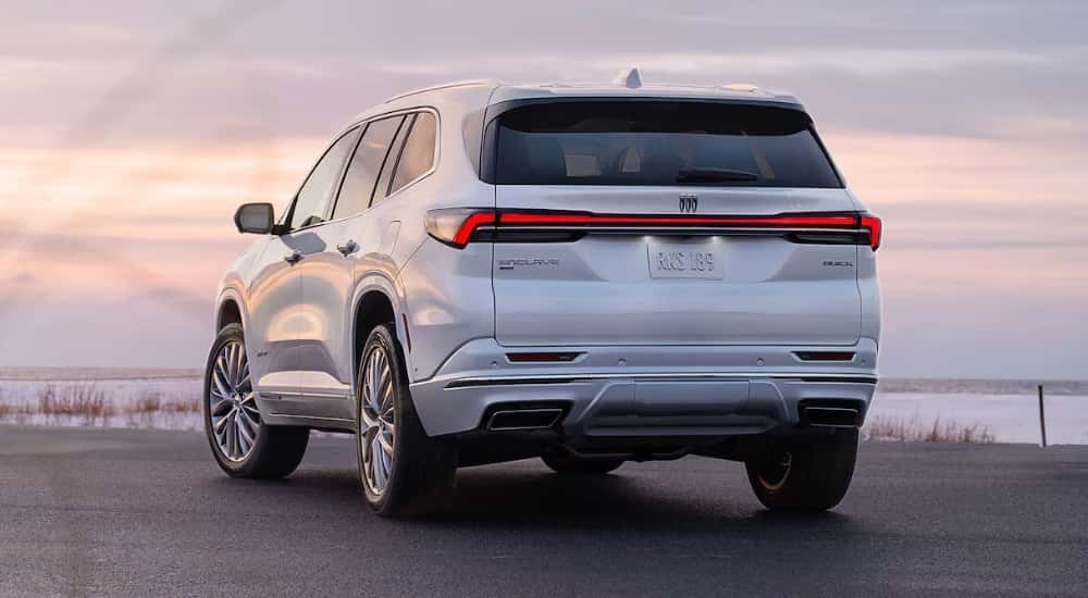 Rear view of a white 2025 Buick Enclave parked on a lot