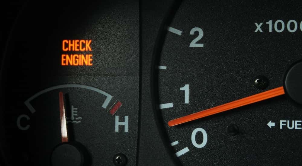 Check engine light on a dashboard