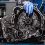 Technician working on a transmission