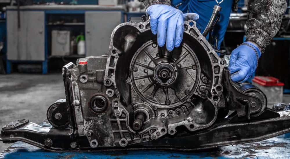 Technician working on a transmission