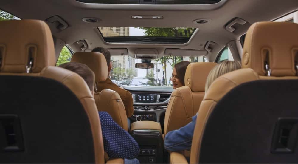 People sitting in a 2019 Buick Enclave