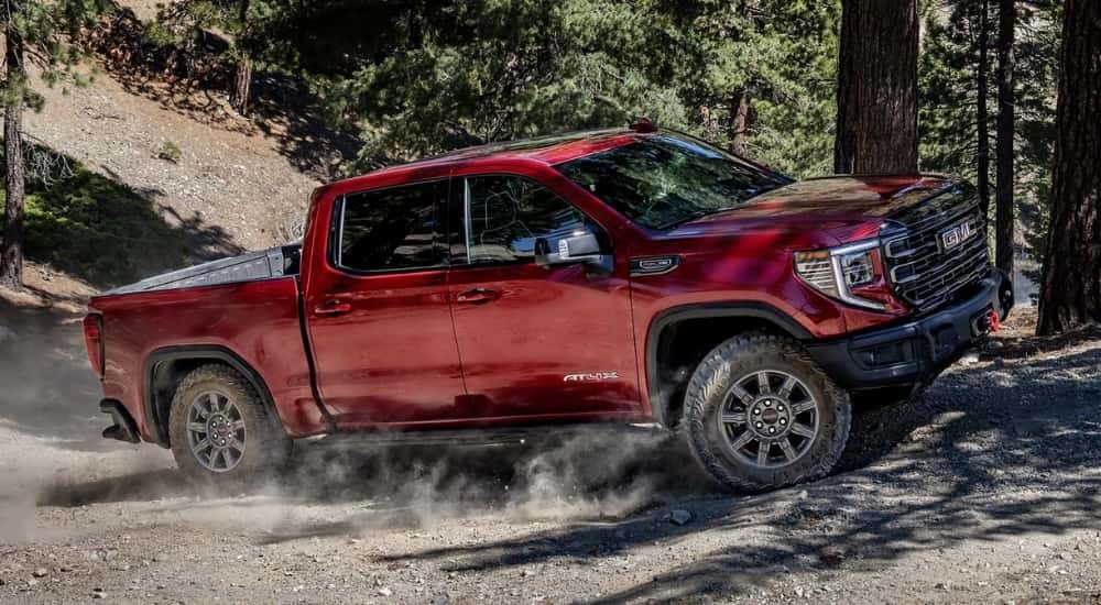 Red 2025 GMC Sierra 1500 AT4X off-roading