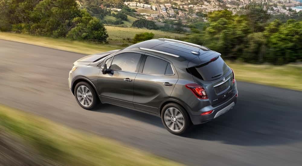 Grey 2017 Buick Encore driving on an open road