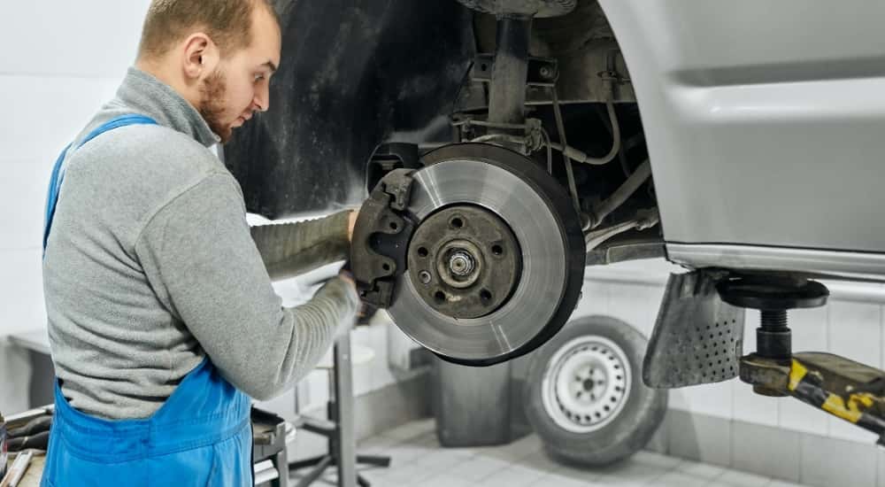 Mechanic performing a brake service